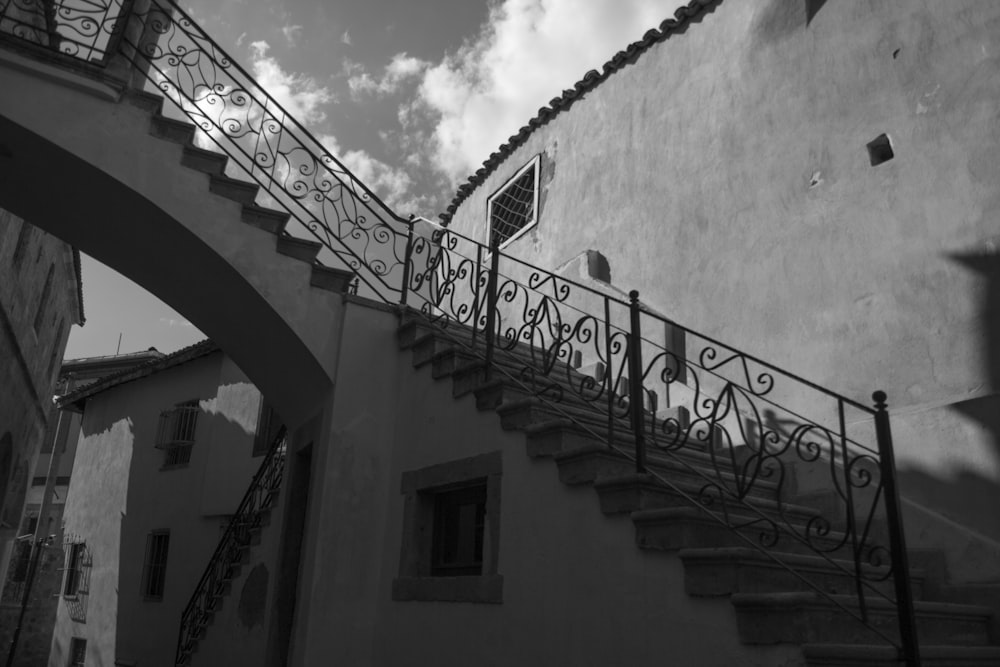 a black and white photo of a stair case