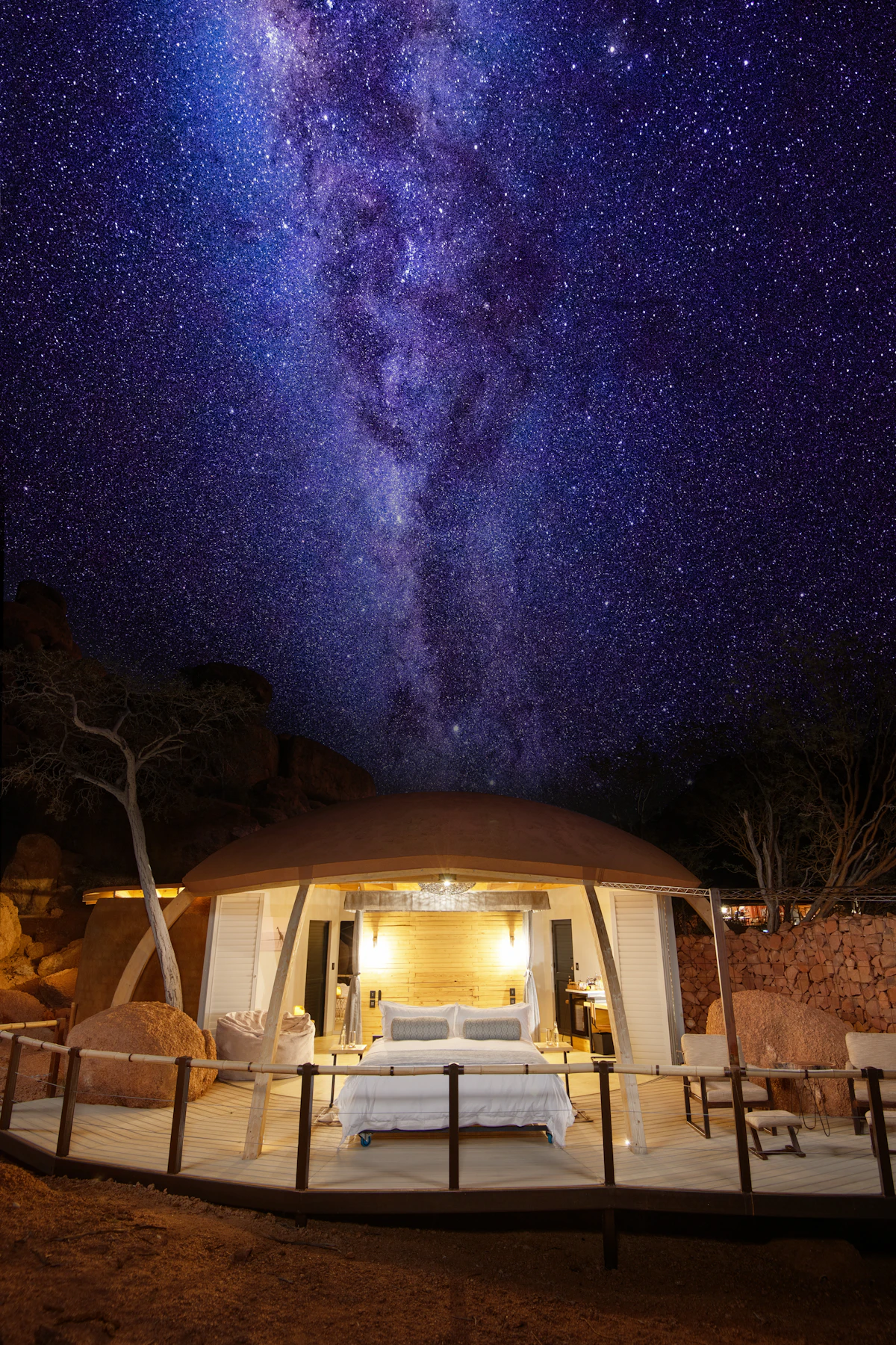 Bed under a star-filled Namibian night sky