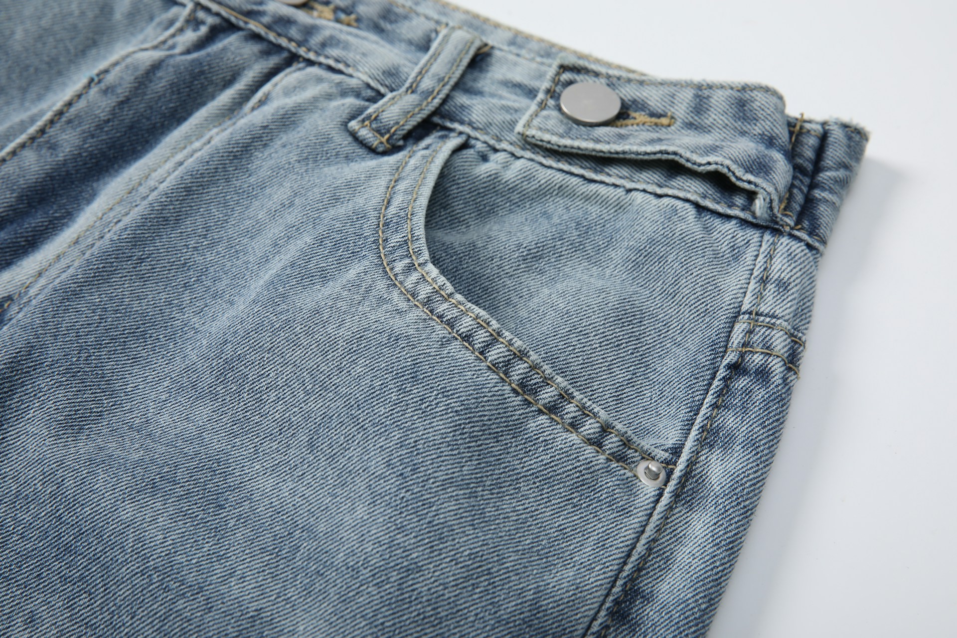 A close-up of the durable fabric of primemart llc jeans, highlighting their quality and versatility for working women.