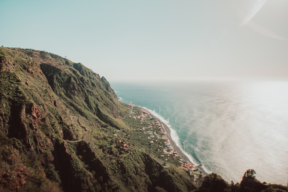 a view of the ocean from the top of a mountain