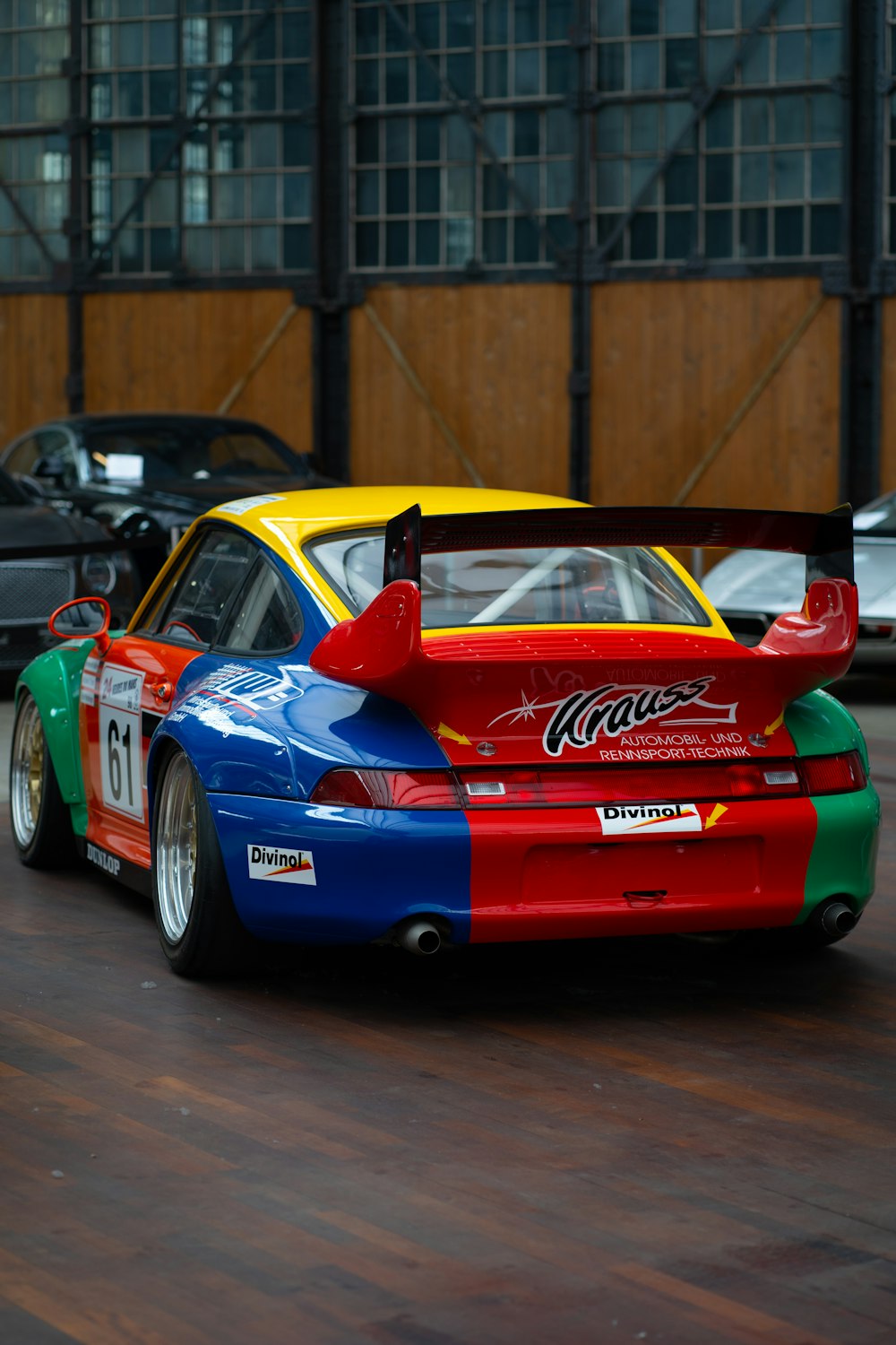 a colorful race car on a race track