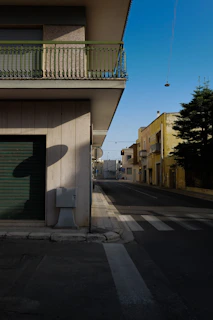A quiet, forgotten urban corner in Brest, captured at dusk with soft shadows and subtle textures.