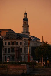 Historic monument glowing in warm sunset light with soft shadows enhancing architectural details.