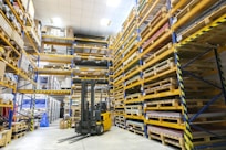 a large warehouse filled with lots of pallets