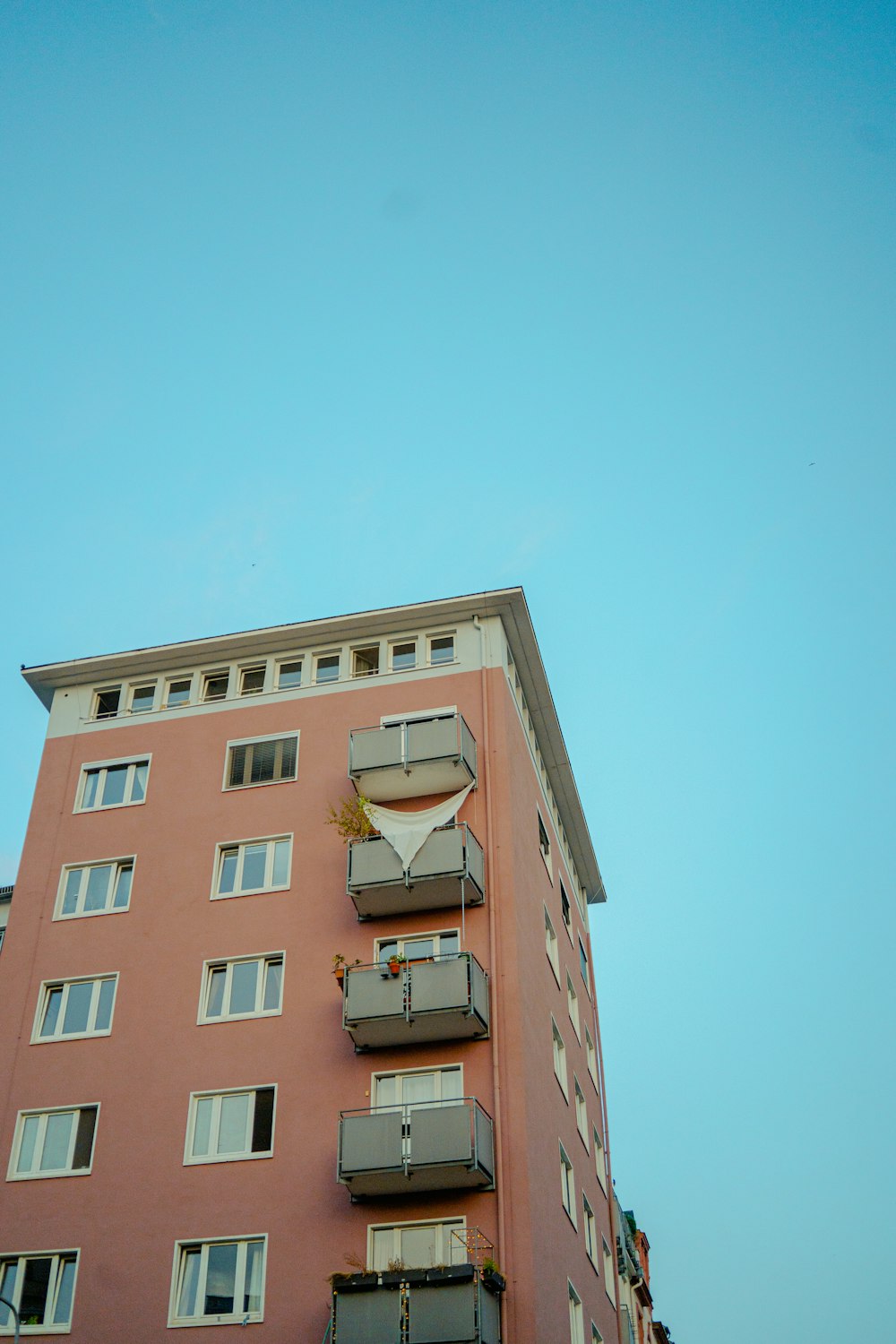 a tall building with balconies and balconies on the balconies