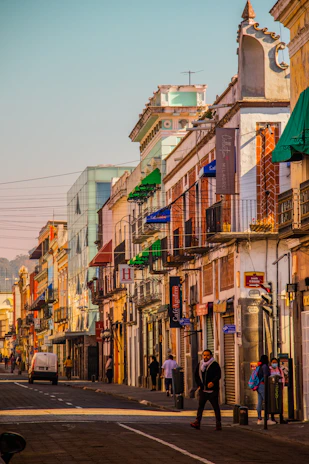 A vibrant street scene with rich colors and grain texture, showcasing the depth of color film.