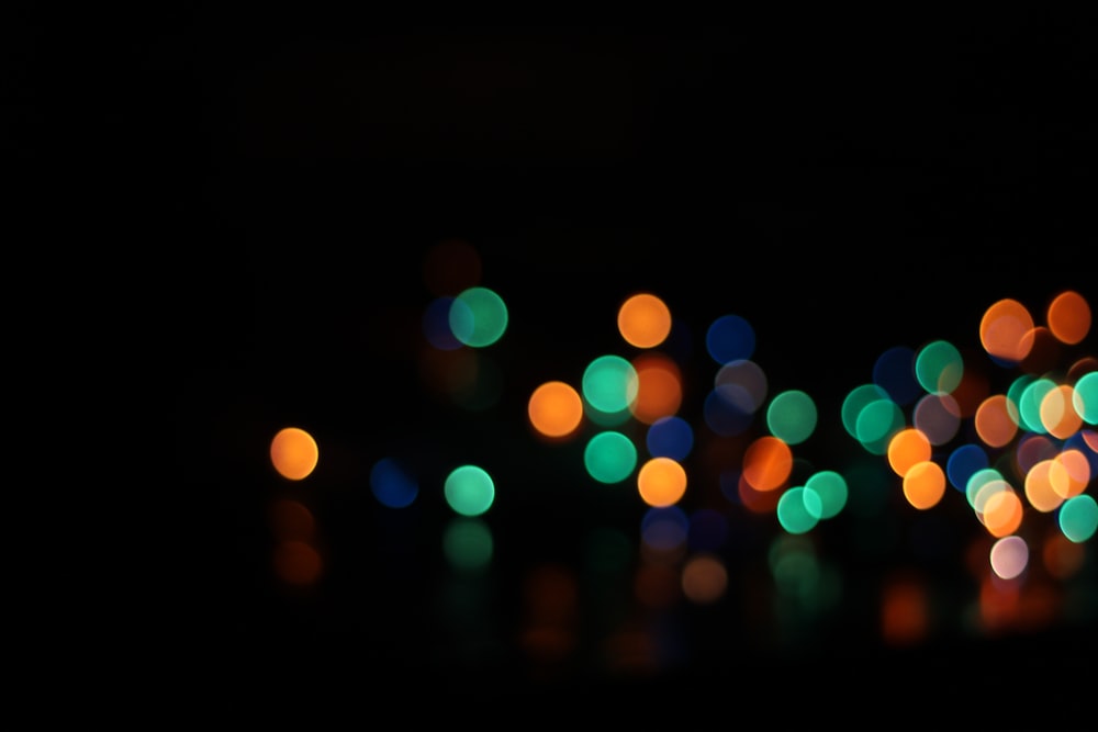 a blurry photo of lights in the dark