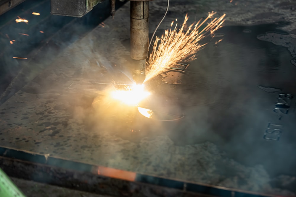 a welder working on a piece of metal