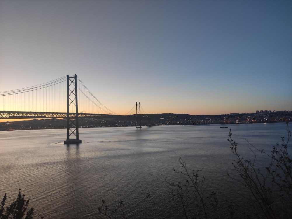 a large bridge spanning over a large body of water