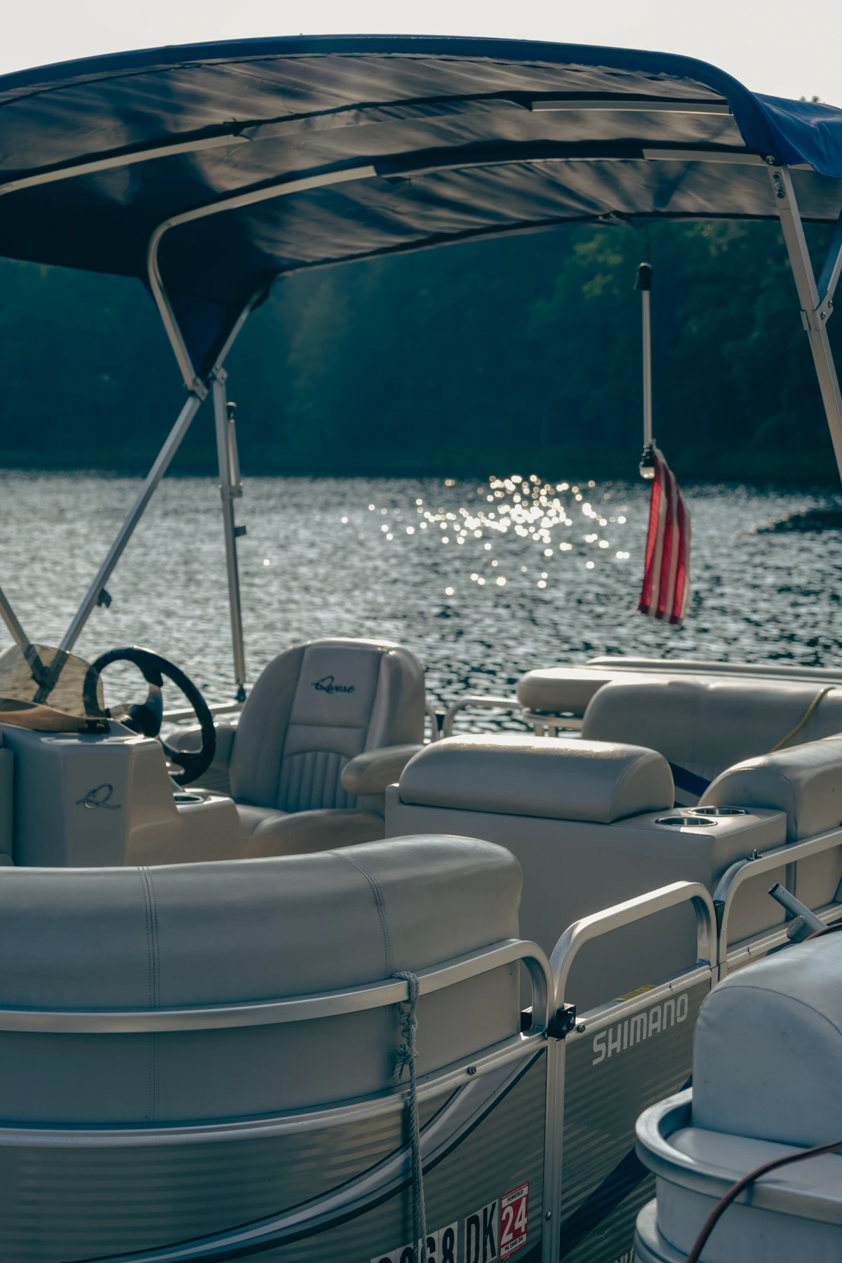 Modern boat seating with white marine upholstery and chrome details