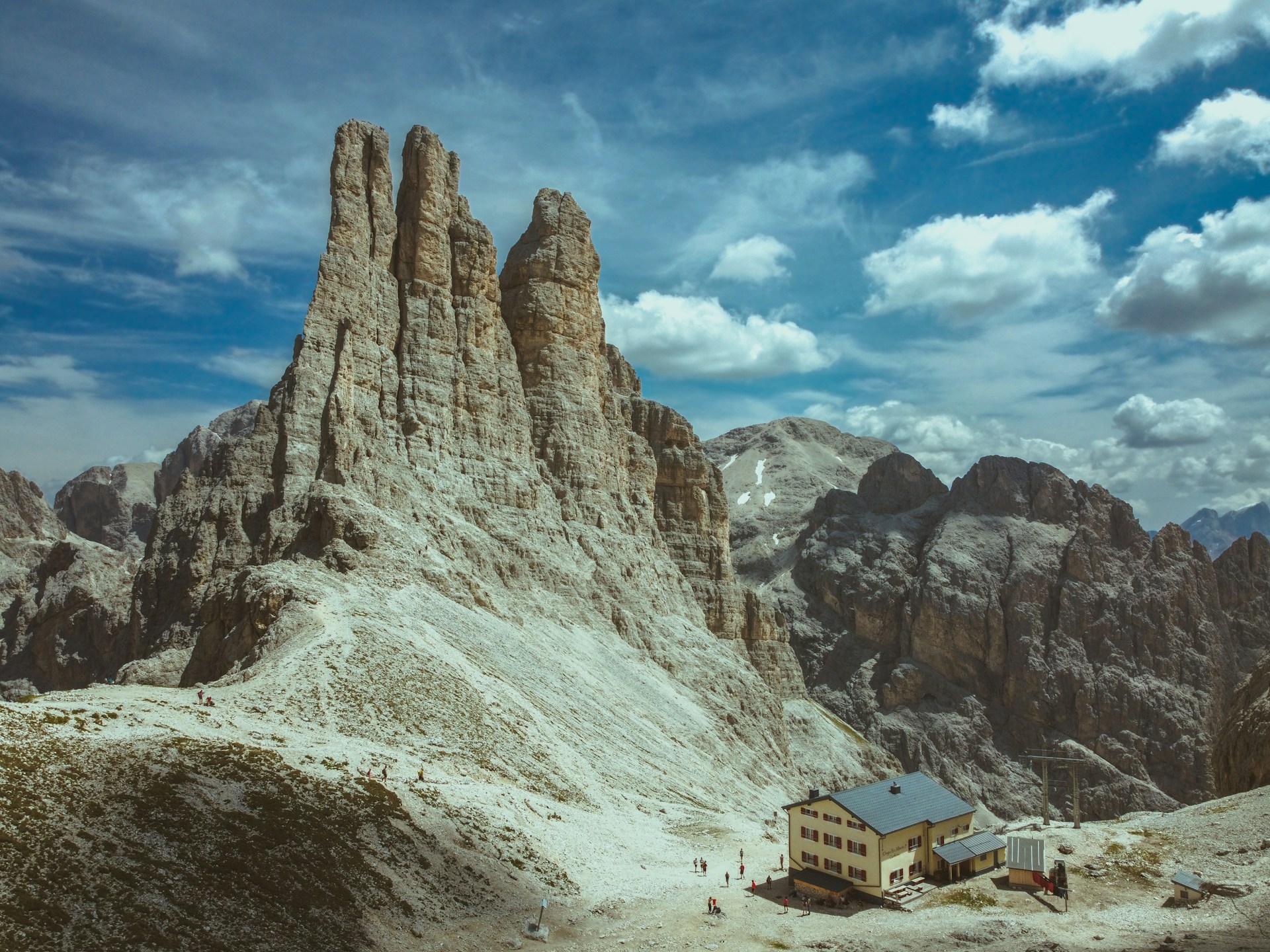 a house in the middle of a mountain range