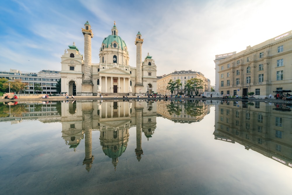 a reflection of a building in the water