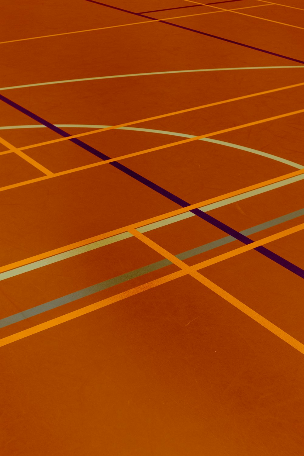 a tennis court with lines painted on it