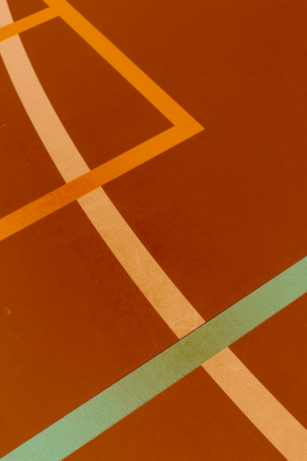a tennis court with lines painted on it