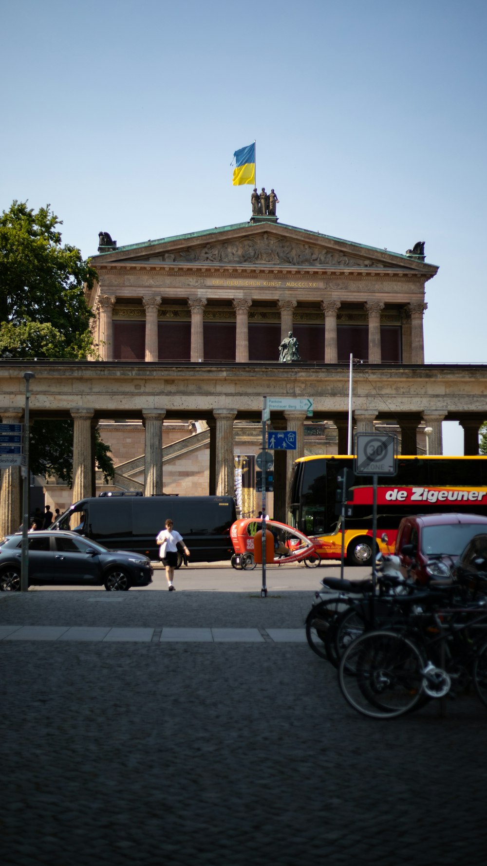 a street scene with a bus and cars