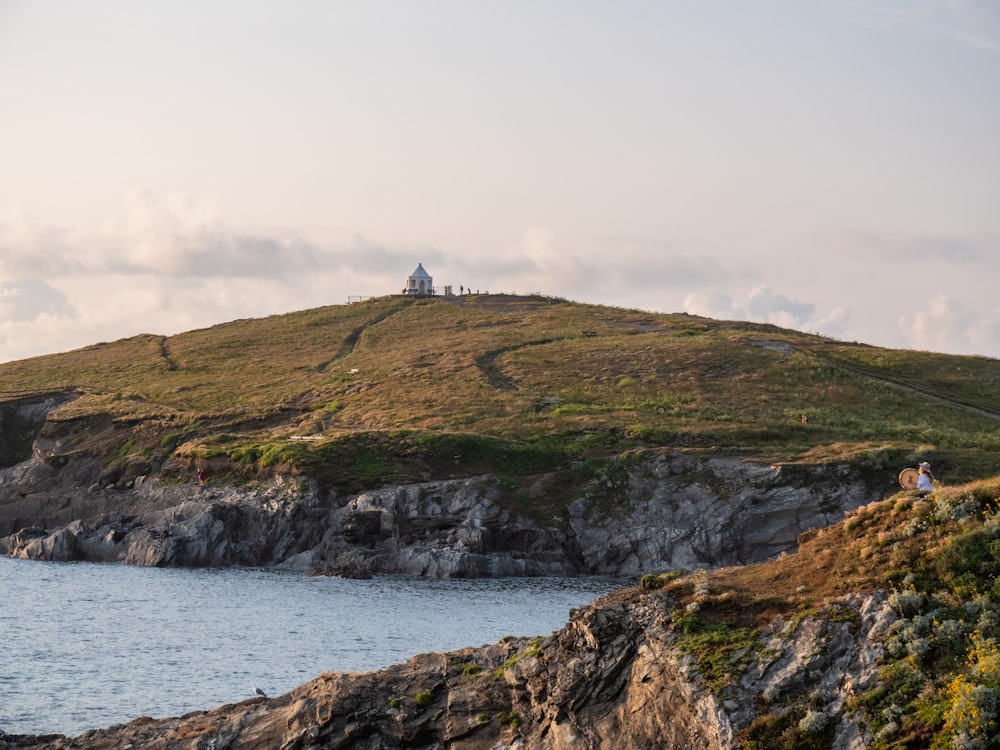 a hill with a house on top of it