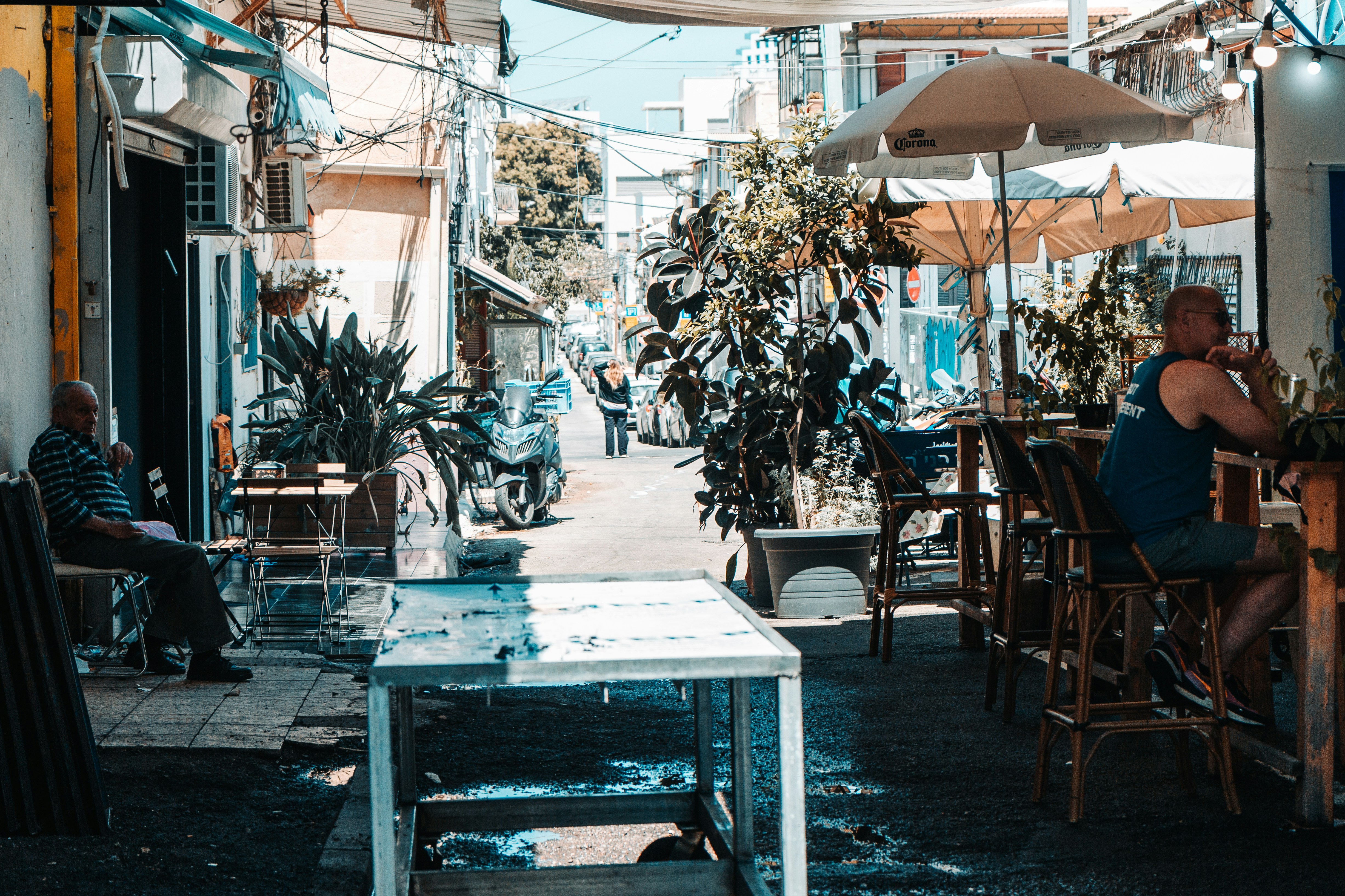 a man sitting at a table in a restaurant
