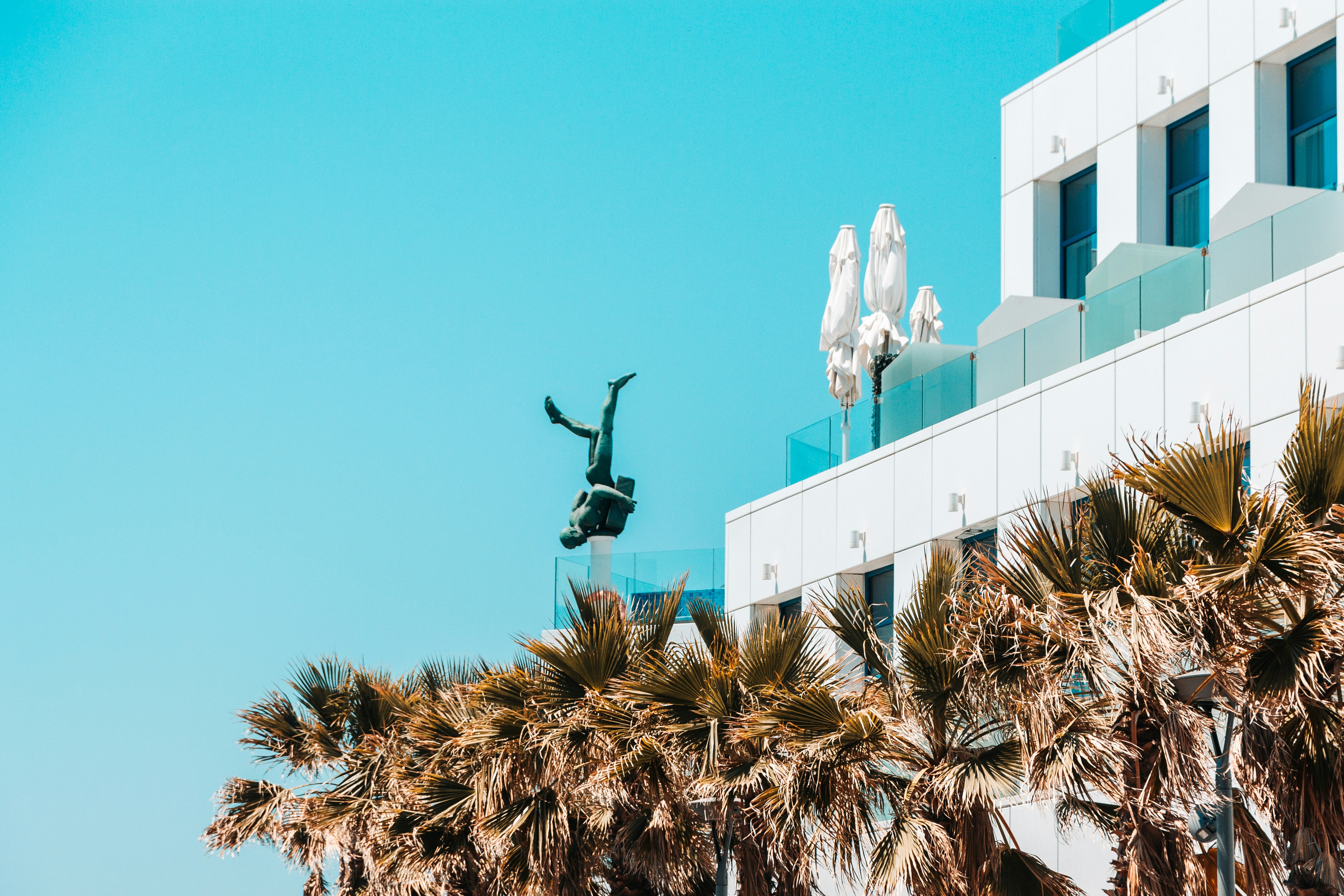 a person is in the air on a surfboard