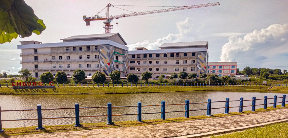 a large building with a crane on top of it