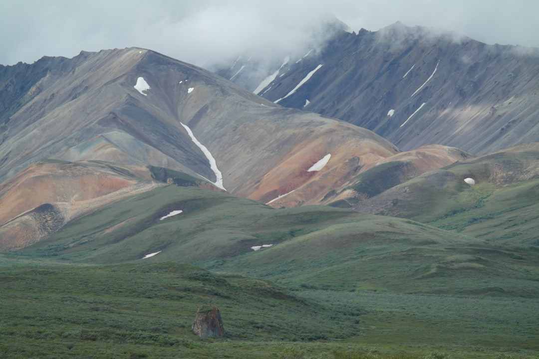 a group of mountains with snow on them,