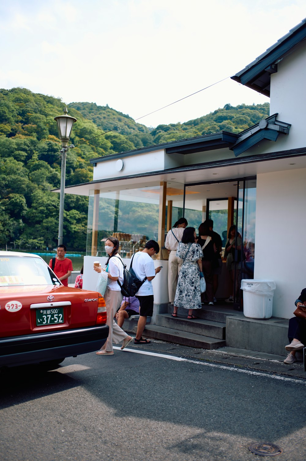 a group of people standing outside of a building