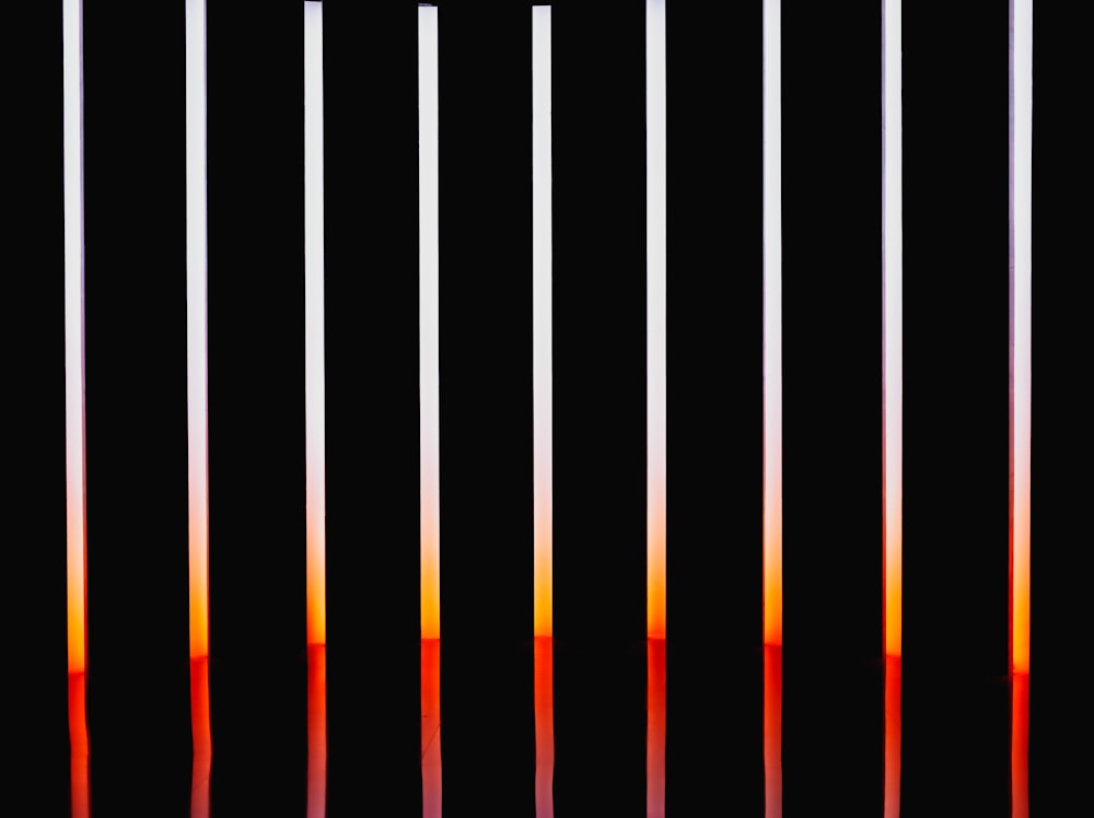 a series of thin lines with a black background