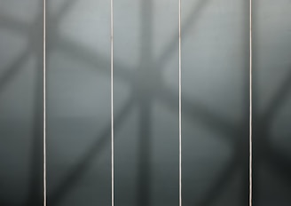 A sleek industrial-style grid layout showing three large images stacked above bold headings and short descriptions.