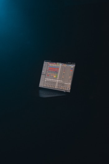 a computer monitor sitting on top of a desk