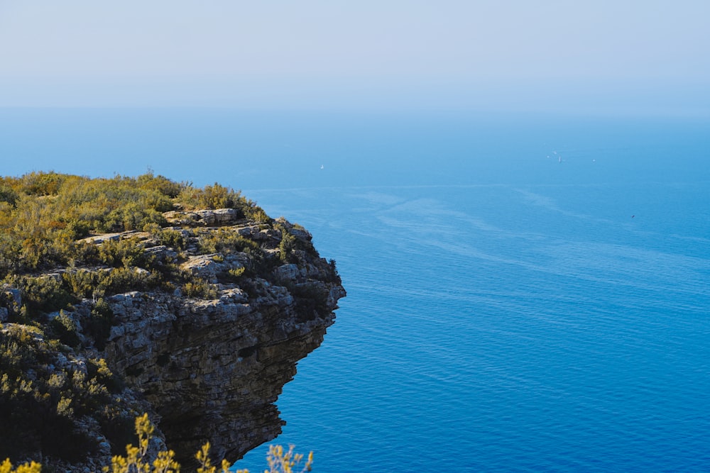 a view of the ocean from a cliff