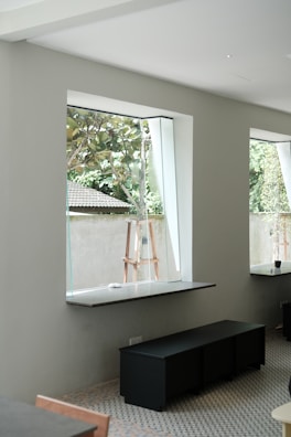 Interior view of a minimalist living space with natural lighting.