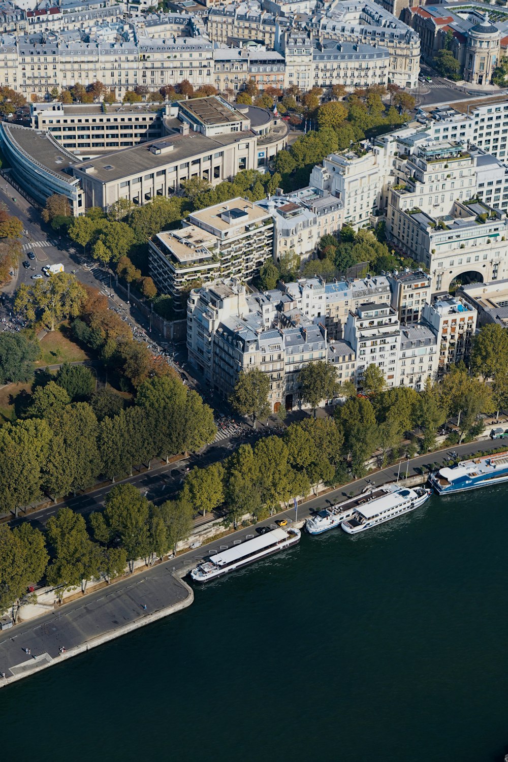 an aerial view of a city and a body of water