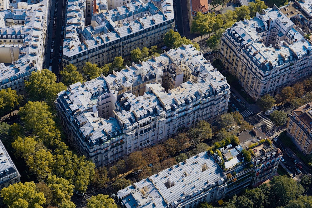 an aerial view of a city with lots of tall buildings