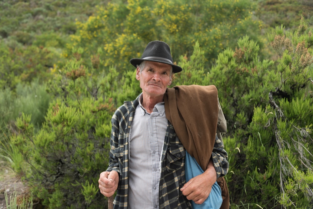 a man with a hat and a backpack