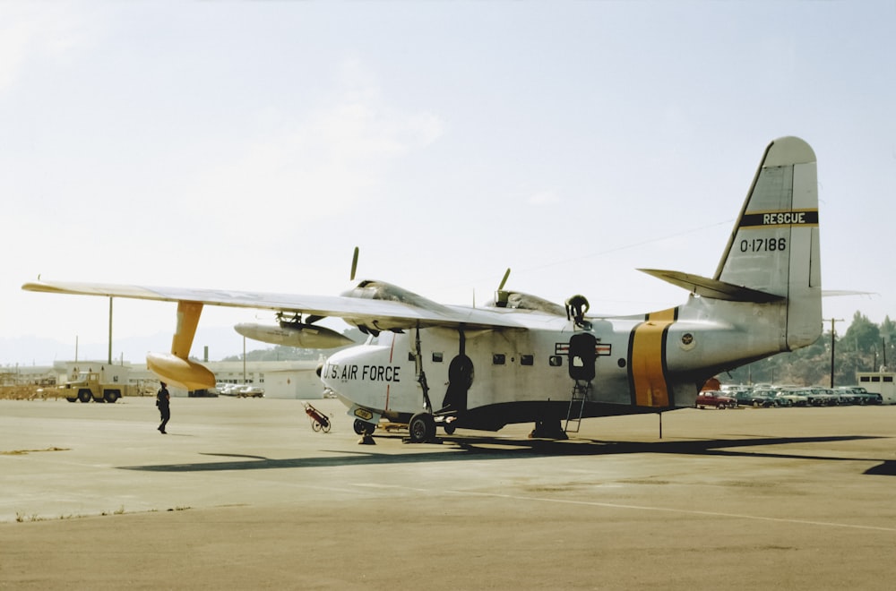 a small airplane sitting on top of an airport tarmac