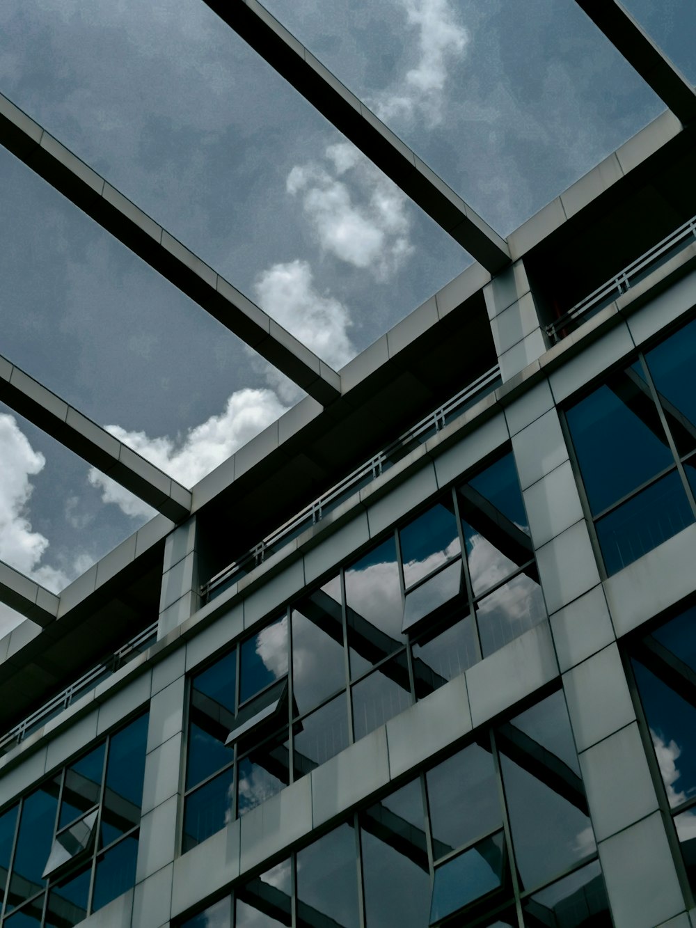 a very tall building with a sky in the background