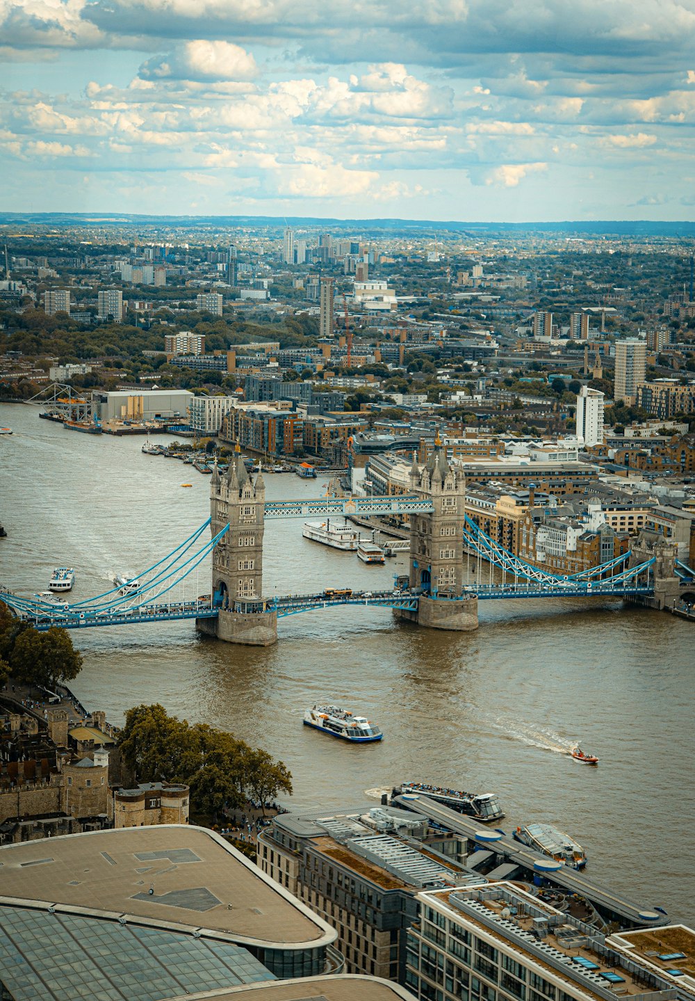 a view of a city with a bridge in the middle of it