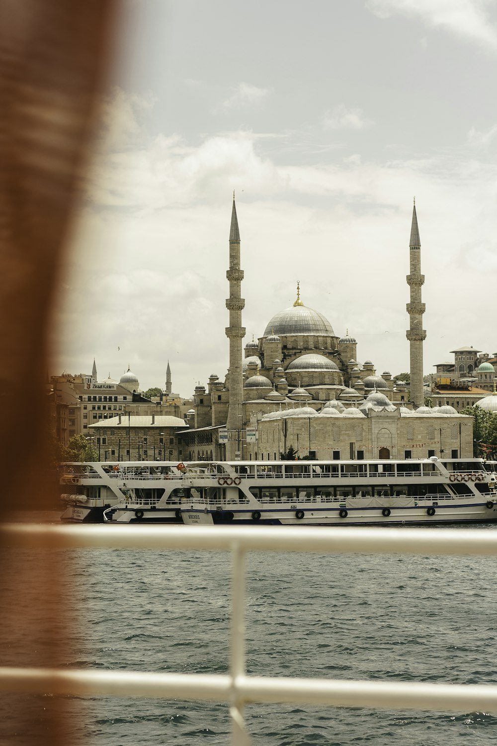 a view of a large body of water with a building in the background