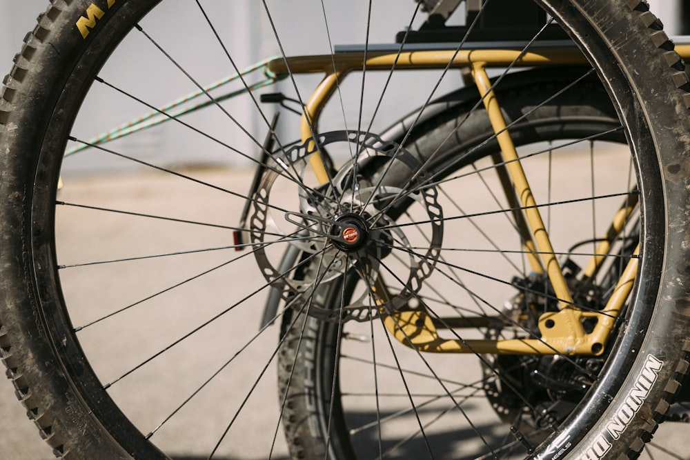 a close up of the spokes of a bicycle