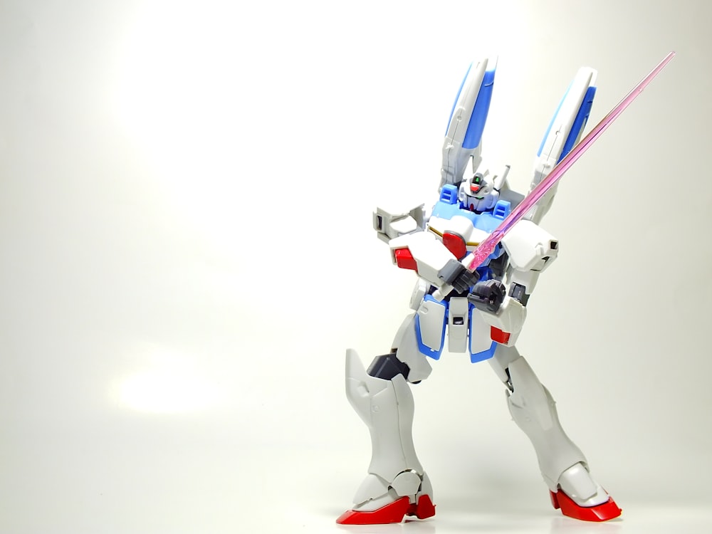 a robot that is standing on a white surface