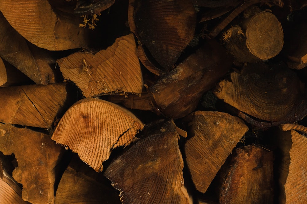 a pile of wood that is cut in half