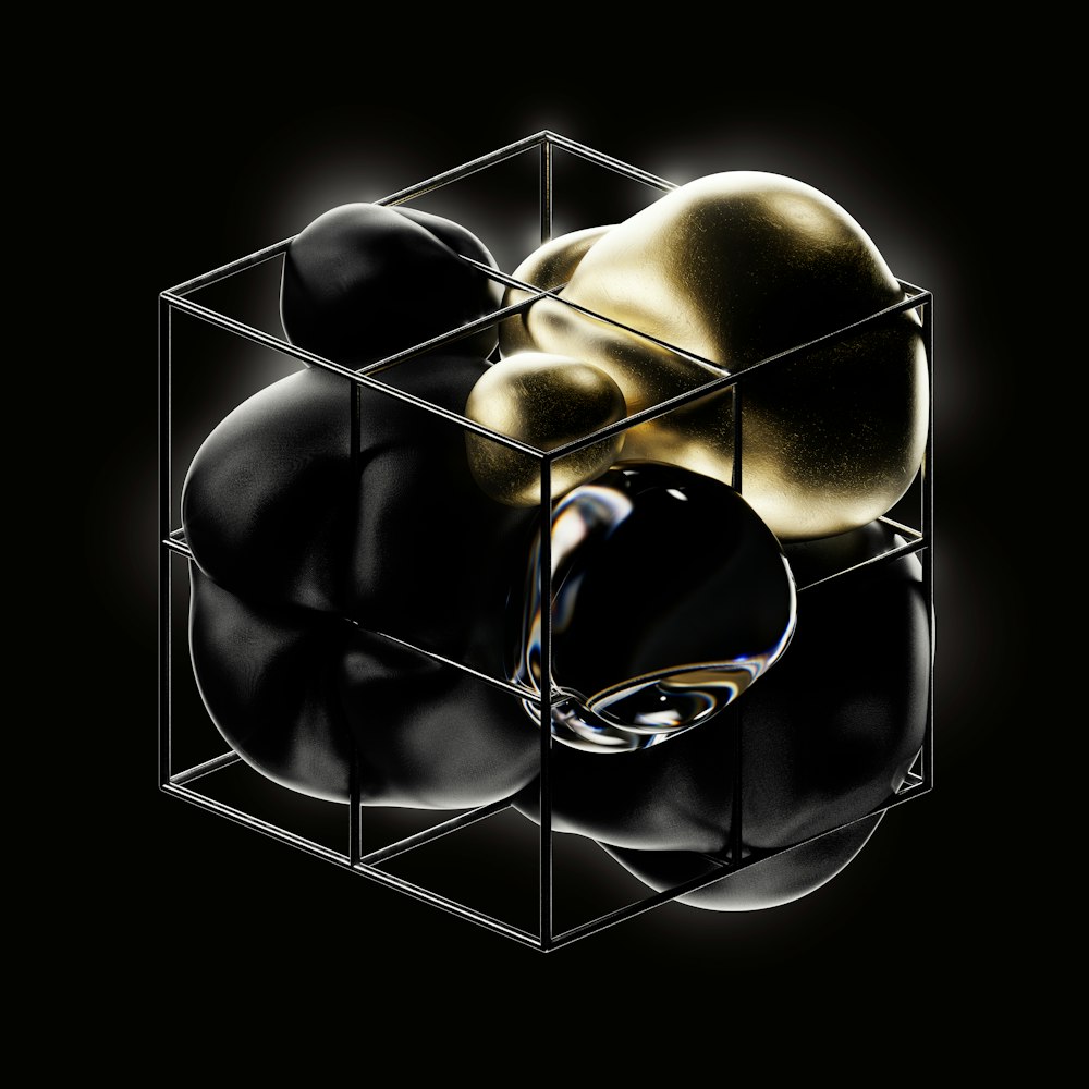 a black and gold object with a black background