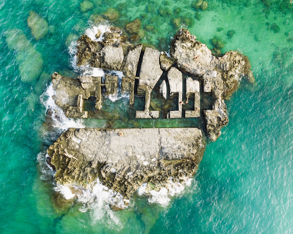 an aerial view of an island in the middle of the ocean