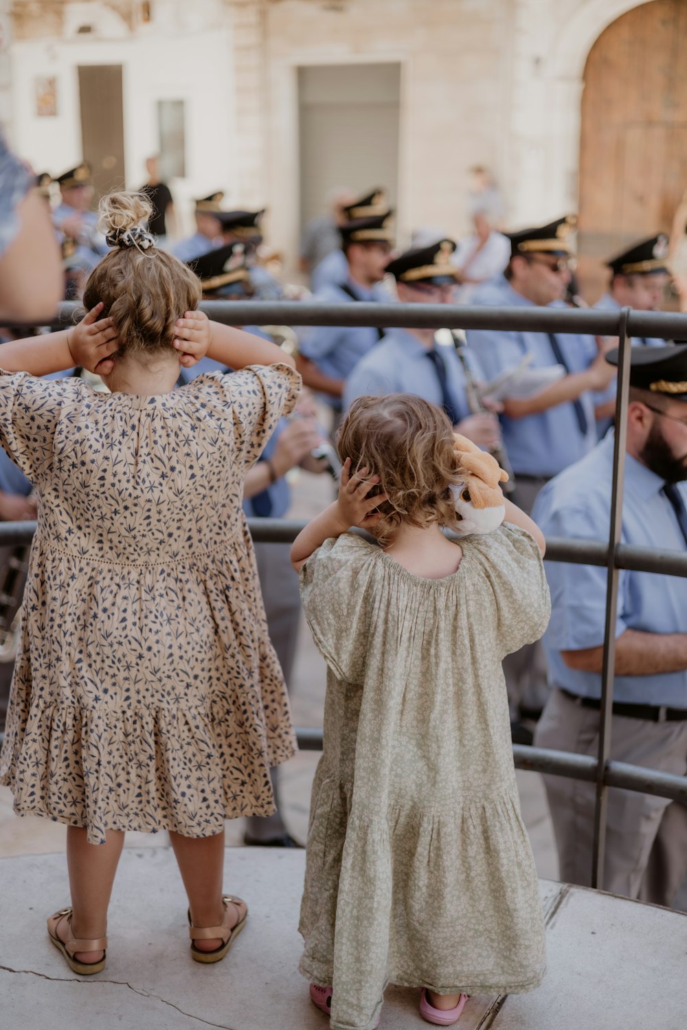 a couple of people standing next to each other