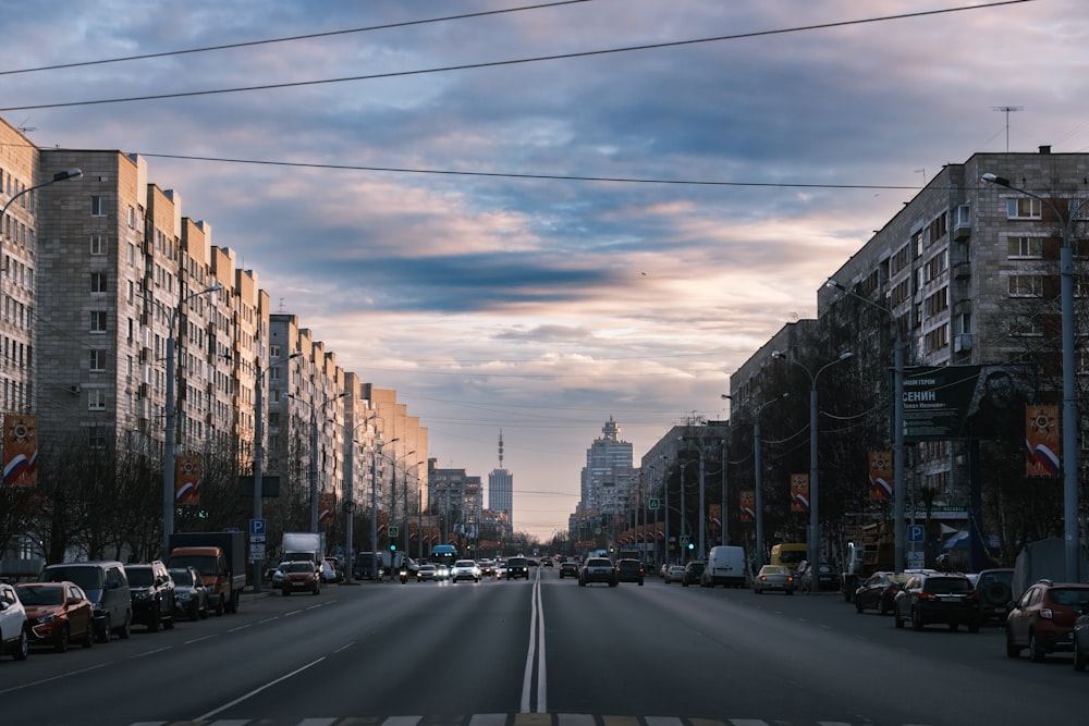 a city street filled with lots of tall buildings