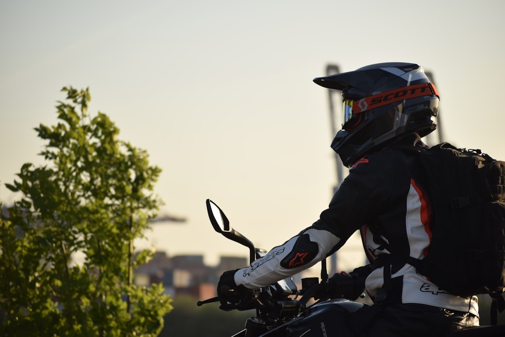 a person on a motorcycle with a helmet on