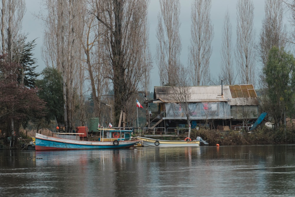 a couple of boats that are sitting in the water