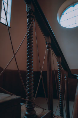 Custom-made wooden staircase with elegant balusters.