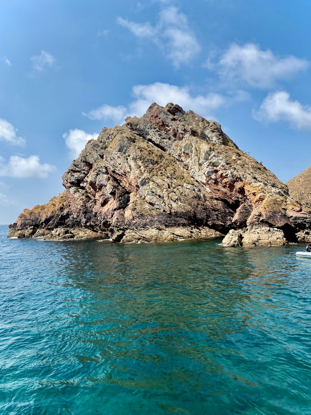 a small island in the middle of a body of water