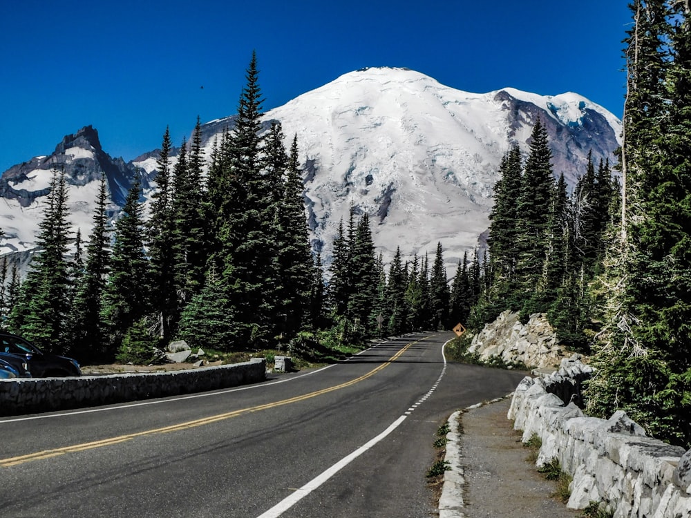 a road with a mountain in the background