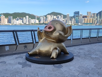 An artistic depiction of pigs exploring iconic NYC landmarks.